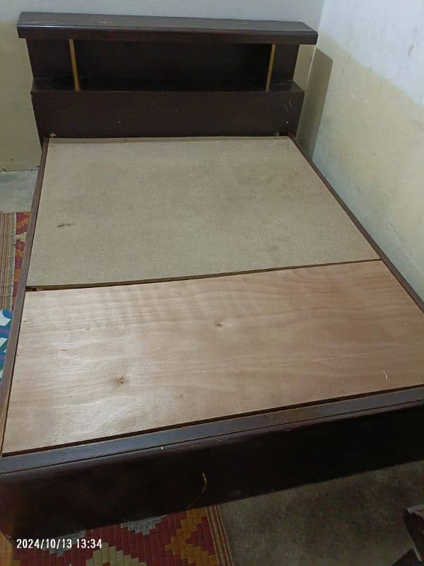 Wooden bed size 6.5 by 5 in good condition without mattress 3