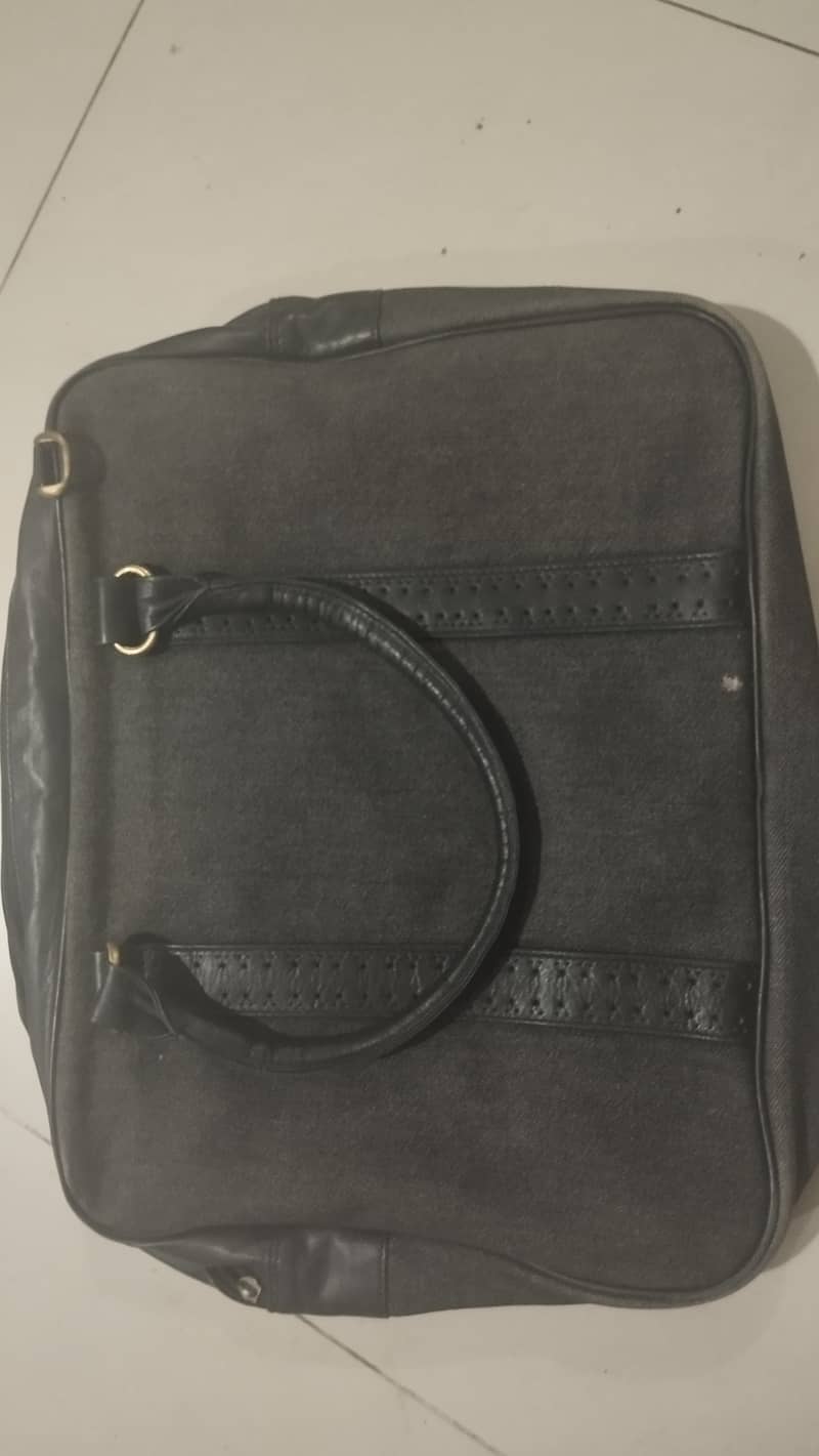 Slightly used branded bag with denim and leather 4