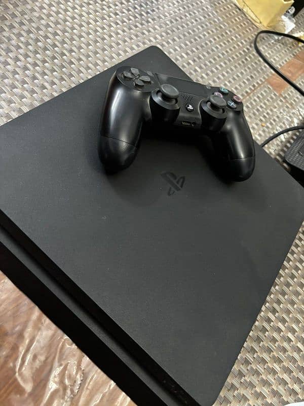 PS4 Slim 500gb with original controller 1