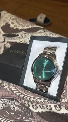 Guess Watch Silver-Tone and Green Analog Watch.