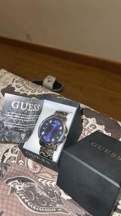 GUESS Paragon Silver-Tone and Blue Analog Watch. 0