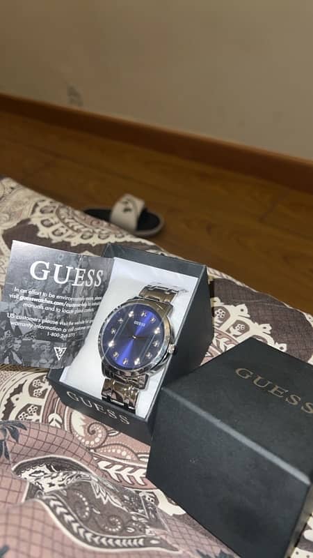 GUESS Paragon Silver-Tone and Blue Analog Watch. 0