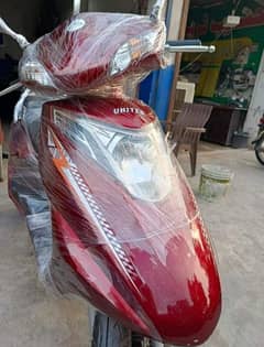 united 100cc self start scooty 2024