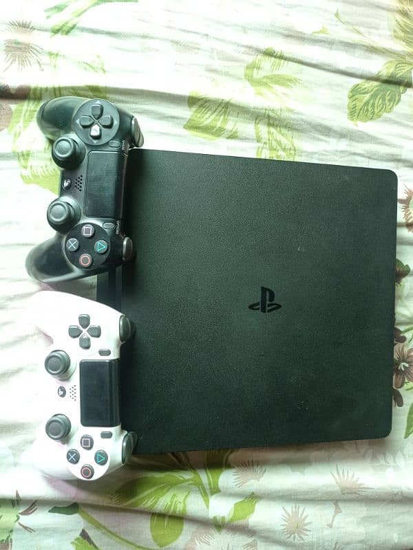 1TB PS4 Slim with 2 original controllers 6