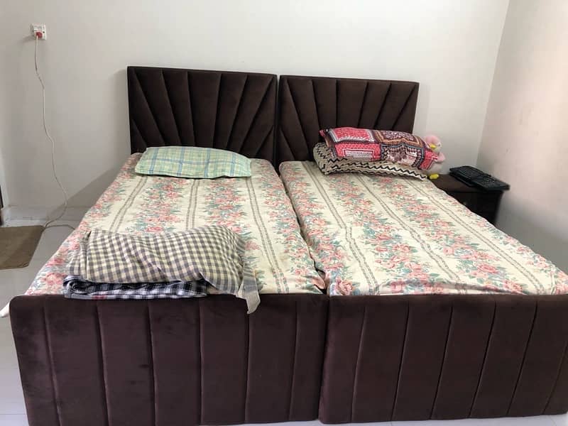 2 single bed is available just 6 month used 1