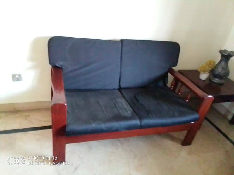 Single wooden beds and sofa set with side table 12