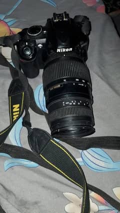 camra D3100 lens sigma 70 300