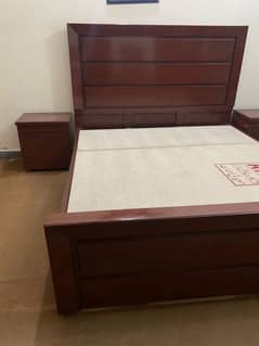 Brand new double bed with side tables