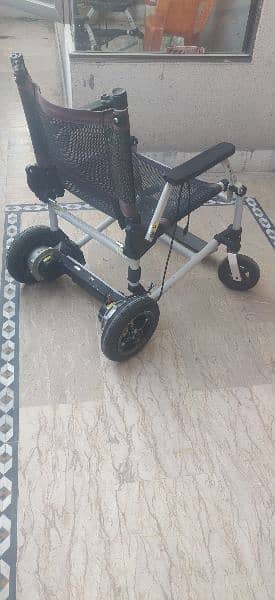 Motorized wheelchair imported foldable. 2 pieces 6