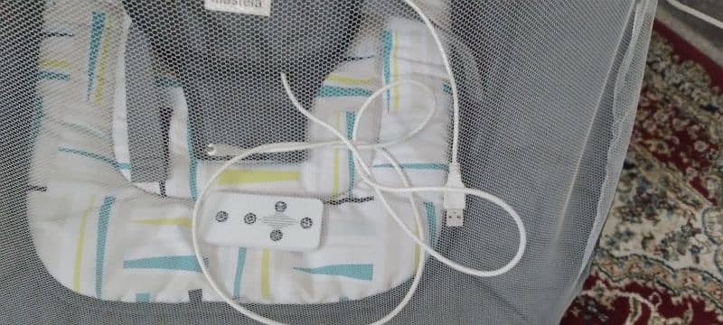 Baby mastella electric swing with Bluetooth , remote, and music 2