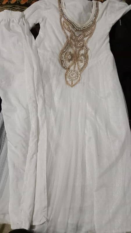 Black shalwar kameez and white frak dress 1