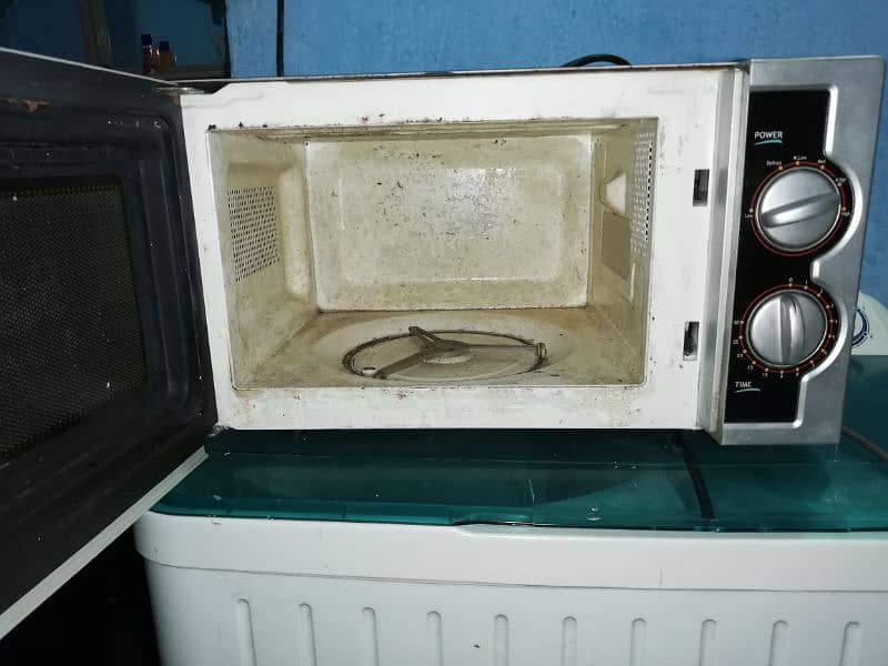 dawlance glass door microwave ovan 25ltr contact 03333O23325 5