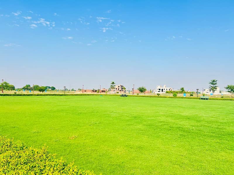 Facing Park Prime Location 1 Kanal Plot For Sale Golf Estate 2 Lake City Lahore 0