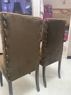 Pair of brown leather chairs