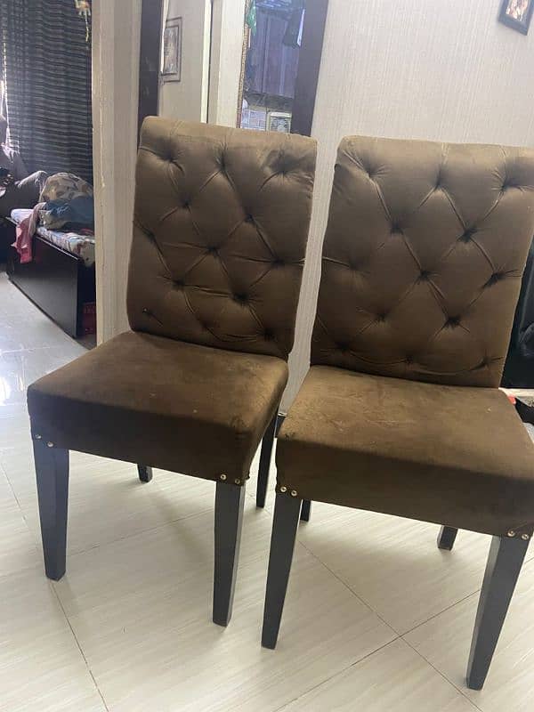 Pair of brown leather chairs 1