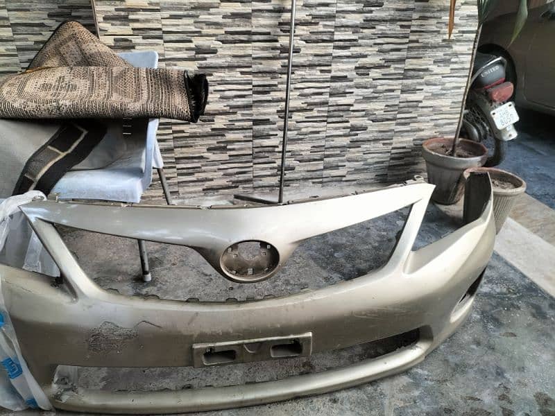 XLI (2012) Model Bumper In Fair Condition 1