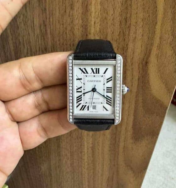 Cartier tank with after market diamond 4