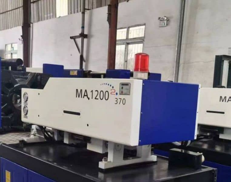 injection moulding machine 9