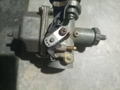 Honda 125 carburetor in good condition like new original ha