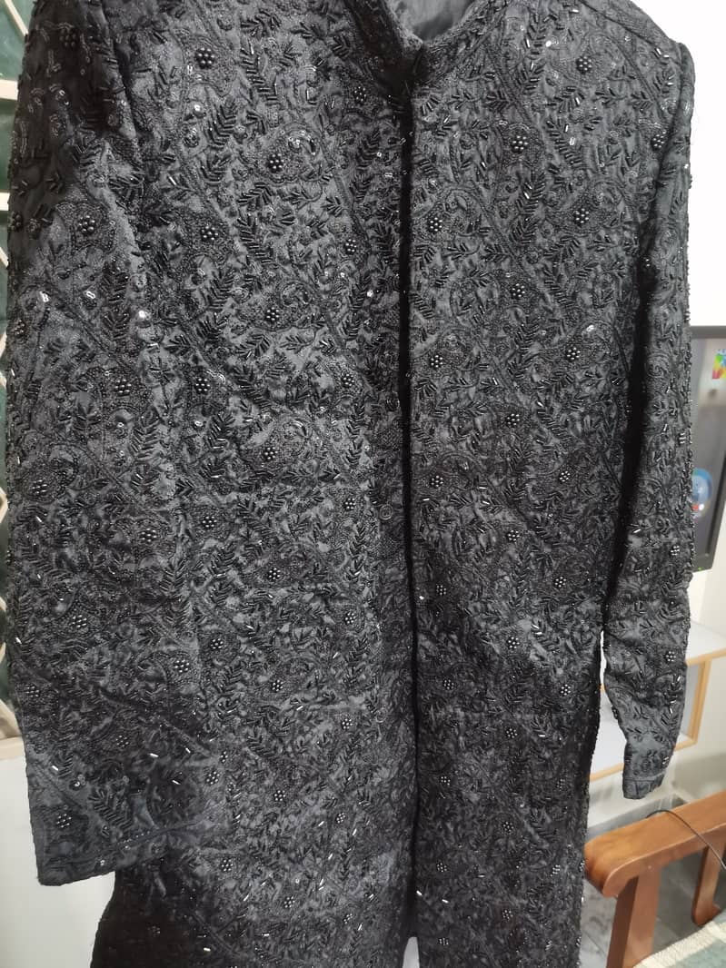 Black Sherwani with mehroom kulla only 1 time used. 3