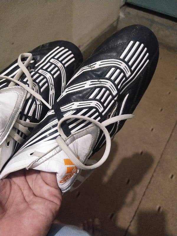 Original addidas foot ball shoes. . . 1