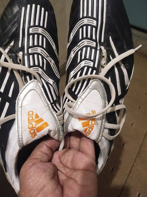 Original addidas foot ball shoes. . . 4