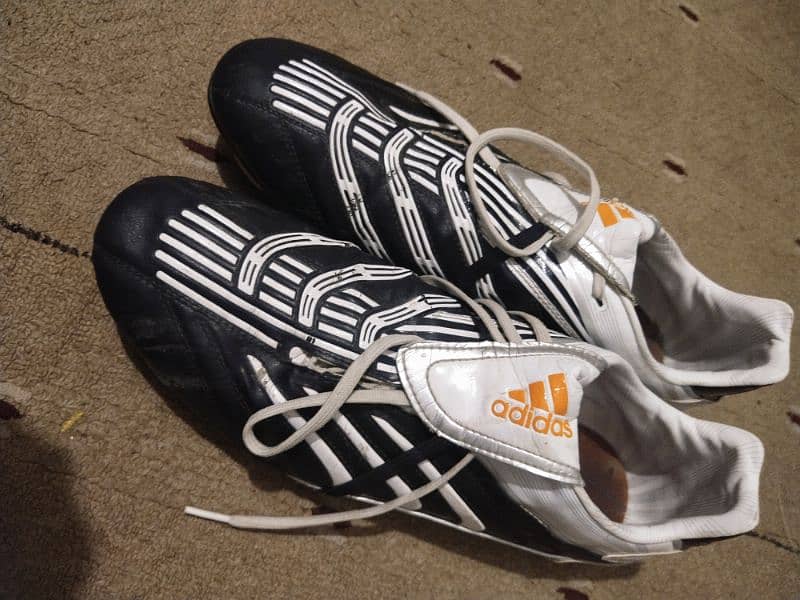 Original addidas foot ball shoes. . . 5