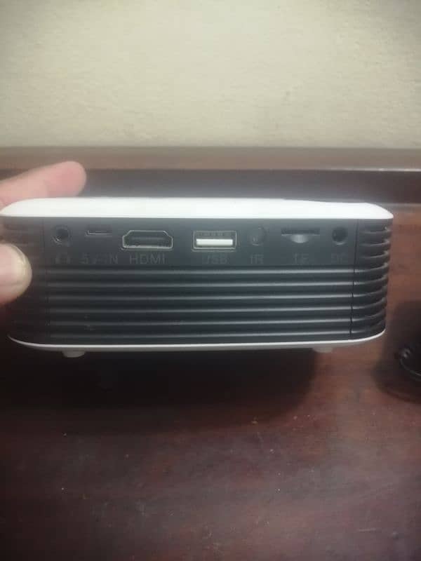 used A2000 Mini Projector 320X240 Pixels 800 Lumens Portable 4