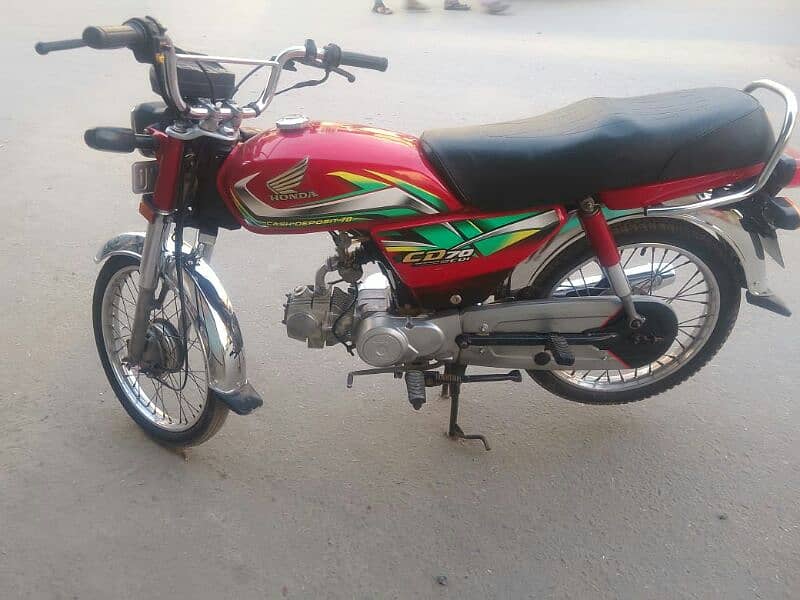 Honda 70 21/22 model Faisalabad punjab number 03016019066. 6