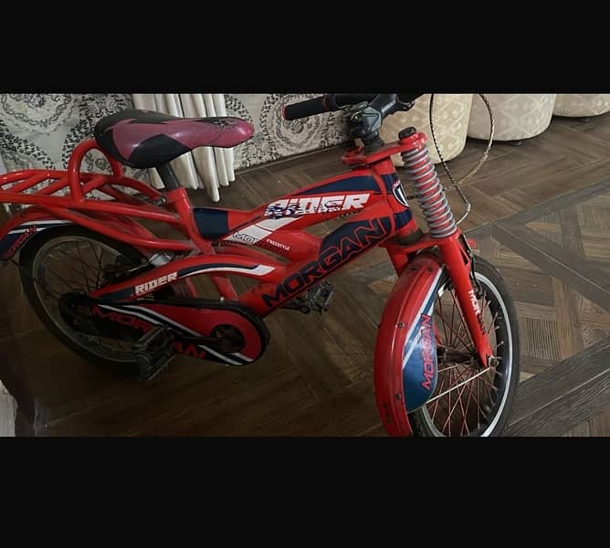 kids bicycle in 16 inches brand new condition ted in colour 2