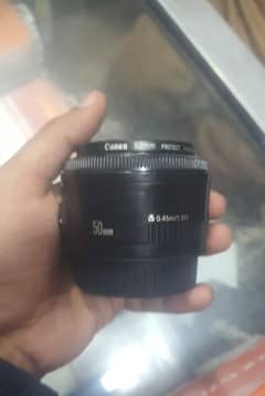 Canon 50 mm lense, hardly used for 1 day