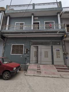 "5 Marla Double-Storey House for Sale near Dubai Plaza, 6th Road. Currently Rented at PKR 60,000/month. " 0