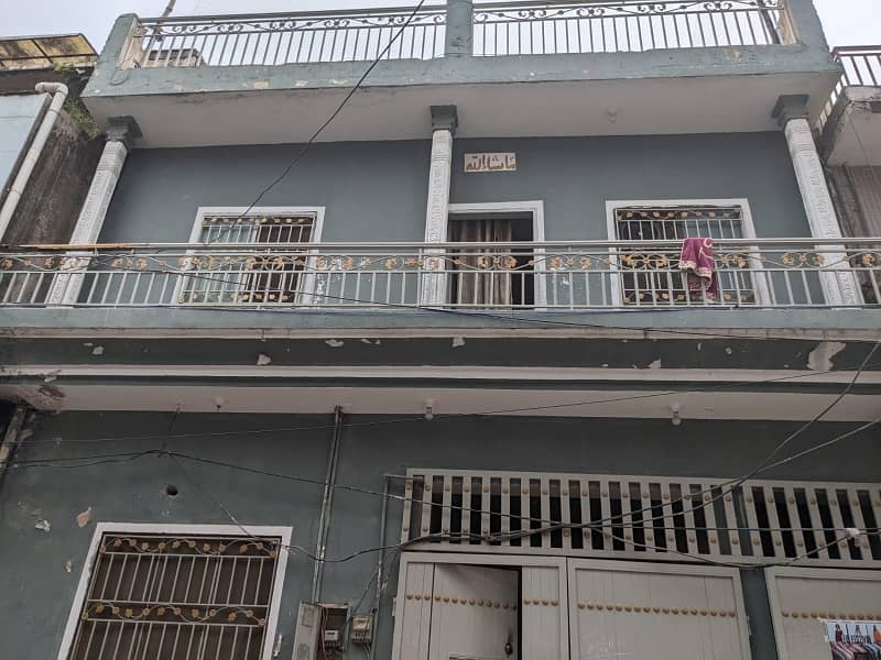 "5 Marla Double-Storey House for Sale near Dubai Plaza, 6th Road. Currently Rented at PKR 60,000/month. " 5