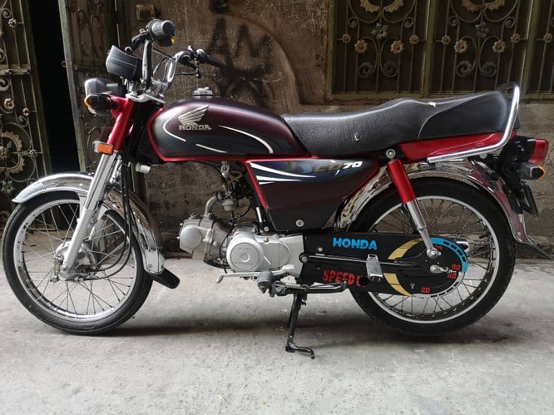 Honda CD 70 2024 4