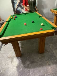 Snooker tables and hand football for sale.