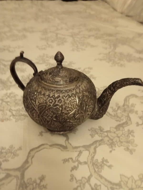 Antique solid silver teapots 0