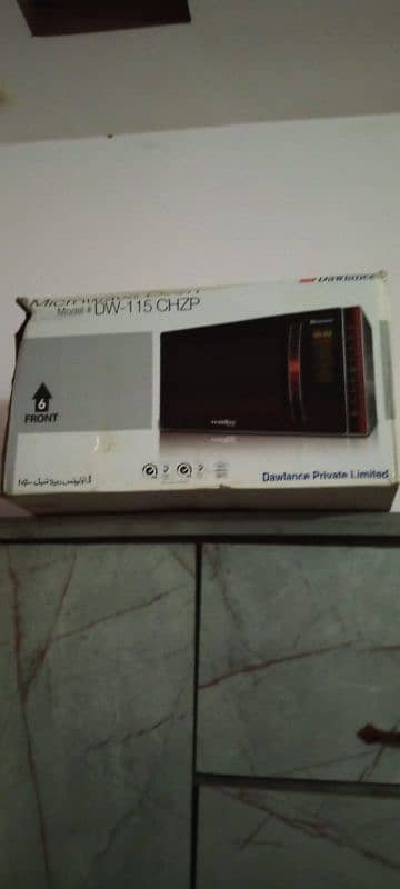 dawlance microwave dw-115 brand new 10by10 urgent sale 0