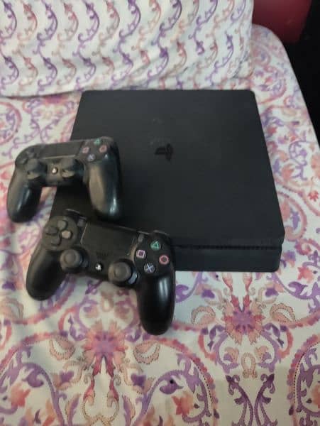 PS4 slim double controler 1 tb storage 0