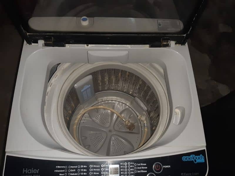 fully automatic Haier washing machine and audionic woofer 2