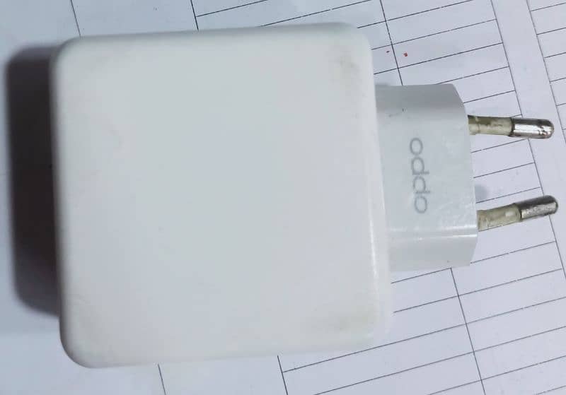 oppo F19 pro Vooc fast charger 30 Watt bilkul oky ha. 0