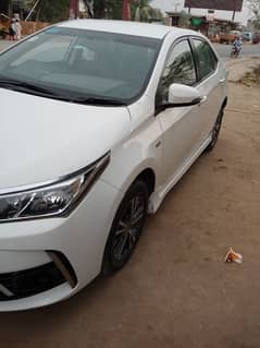 Toyota Corolla GLI 2018 super white mobile no 03016543678