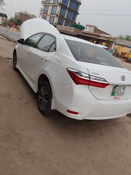 Toyota Corolla GLI 2018 super white mobile no 03016543678 3