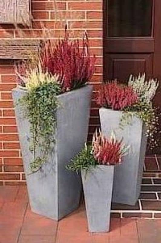 BEAUTIFUL CONCRETE POTS AND PLANTER 6