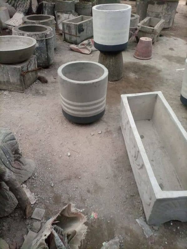 BEAUTIFUL CONCRETE POTS AND PLANTER 8