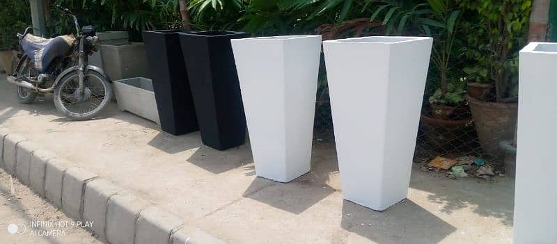 BEAUTIFUL CONCRETE POTS AND PLANTER 9