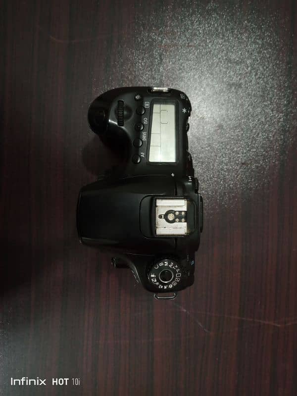 Canon 60D with flash gun and tracker 1