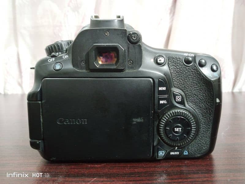 Canon 60D with flash gun and tracker 3