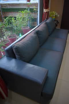 L-shaped sofa with a corner table