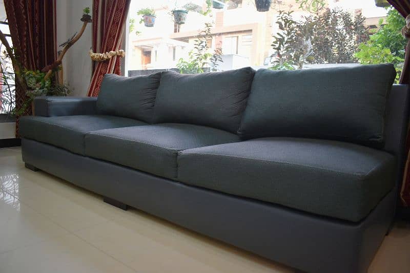 L-shaped sofa with a corner table 1