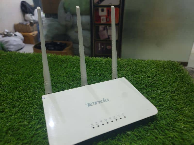 Tenda f3 version 6 tripple antenna wireless router available 1